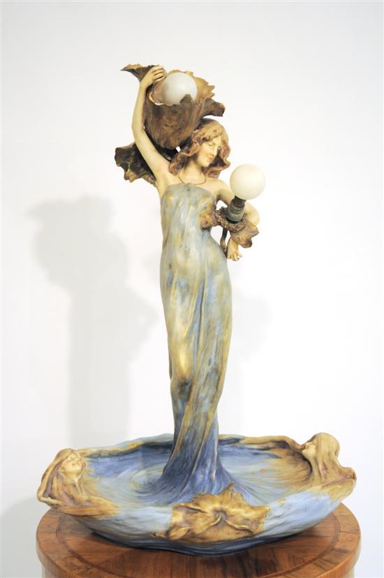 Appraisal: Amphora Austria Art Nouveau porcelain figural lamp modeled as maiden