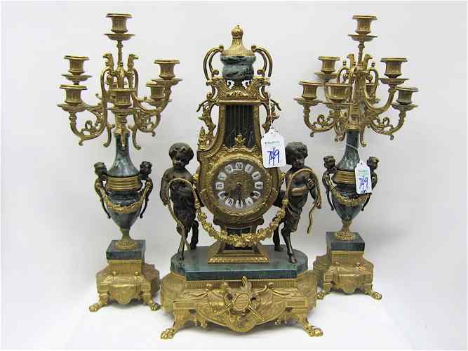 Appraisal: THREE PIECE ITALIAN GILT BRONZE MARBLE CLOCK SET French style