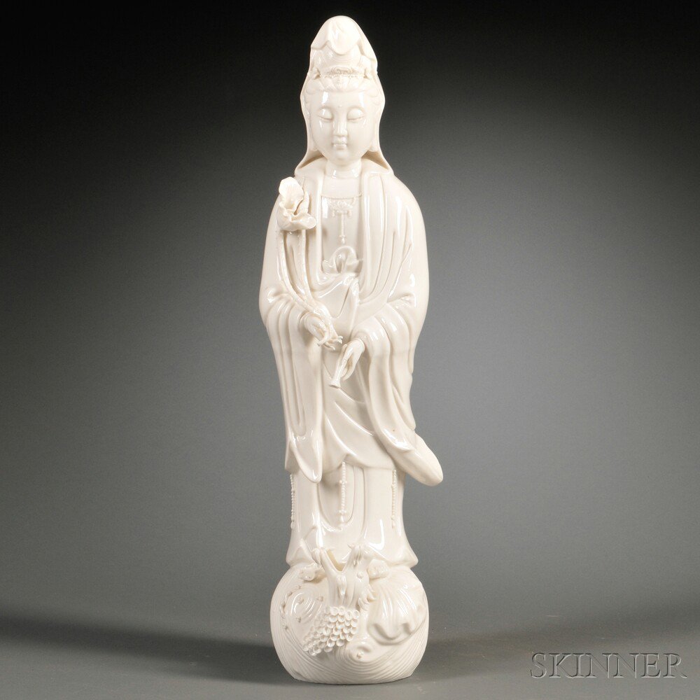 Appraisal: Blanc de Chine Figure of Guanyin China depicted wearing long