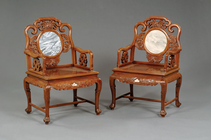 Appraisal: PAIR OF ORIENTAL CARVED TEAK ARMCHAIRS WITH INSET GRAY MARBLE