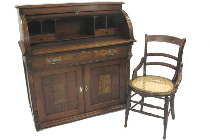 Appraisal: VICTORIAN WALNUT CYLINDER DESK WITH CHAIR Eastlake influence American last