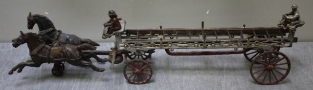 Appraisal: Antique Cast Iron Ives Toy Ladder Truck With figure and