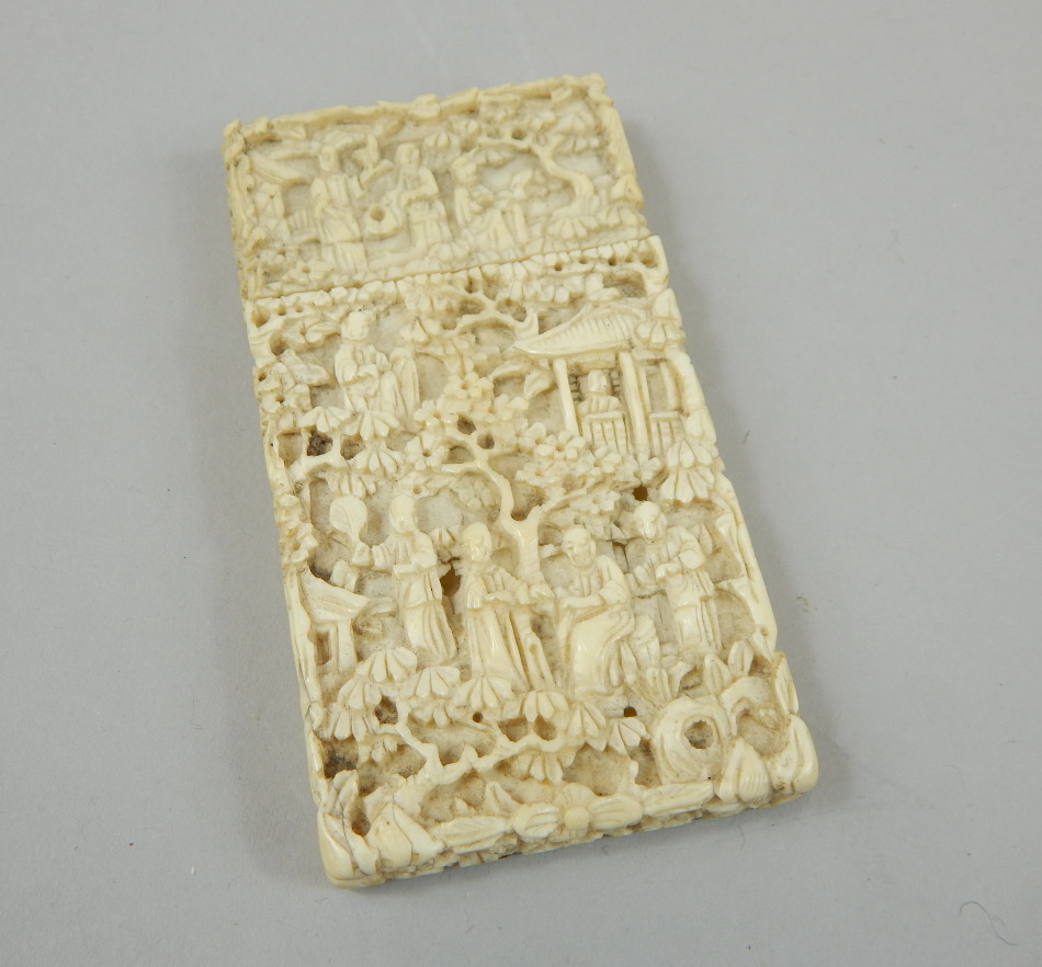 Appraisal: A late thC Chinese ivory card case carved with figures