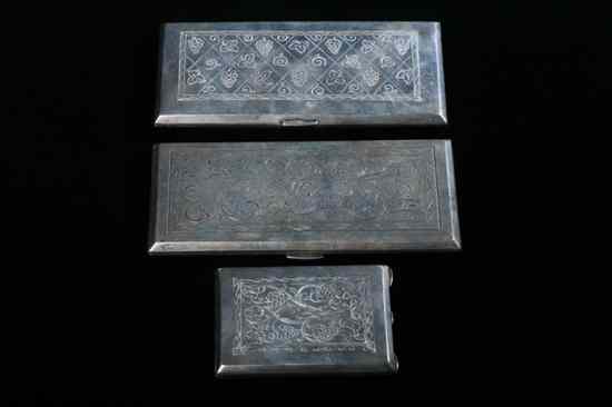 Appraisal: PAIR POLISH SILVER CIGARETTE CASES AND A COMPACT SN maker's