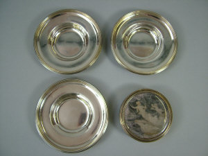 Appraisal: A set of three George III silver waiters London of