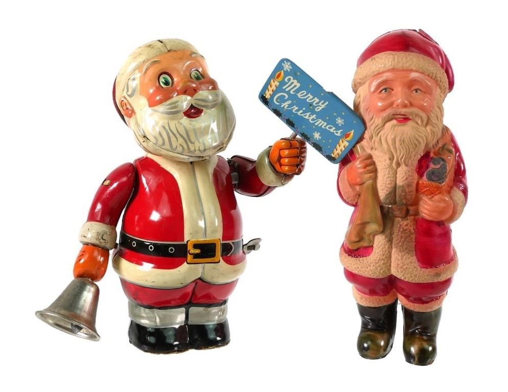 Appraisal: Set of Two vintage holiday Santa Claus figures one is