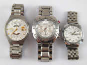 Appraisal: A mixed lot comprising three gent's stainless steel wristwatches