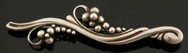 Appraisal: A brooch by Georg Jensen The sterling silver grape vine