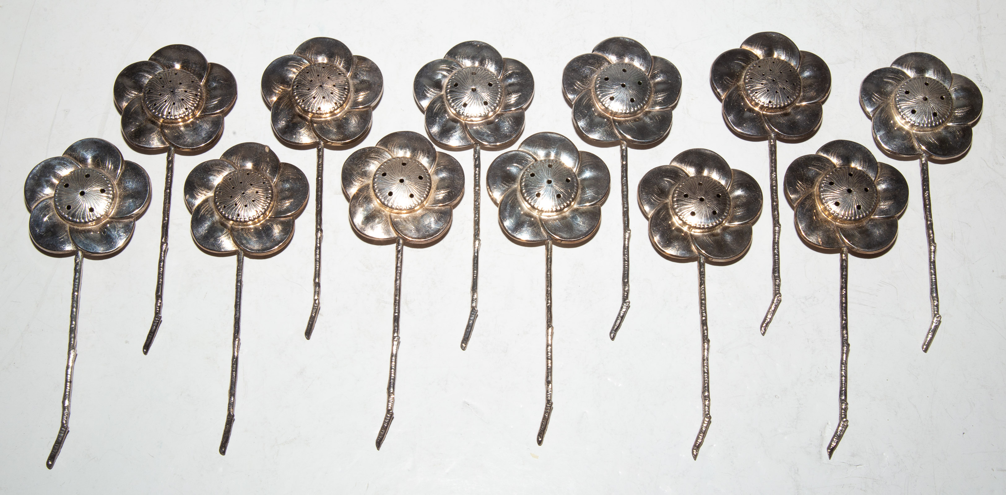 Appraisal: TWELVE STERLING FLOWER-FORM SALT PEPPER SHAKERS Probably Japanese sterling standard