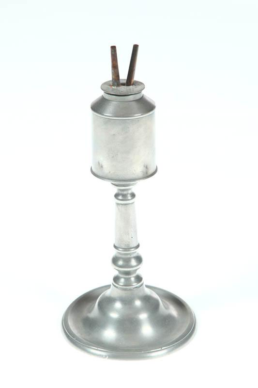 Appraisal: PEWTER LAMP American mid th century Tall stem with a