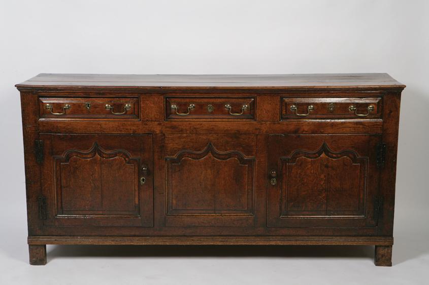 Appraisal: A GEORGE III OAK DRESSER the rectangular top with a