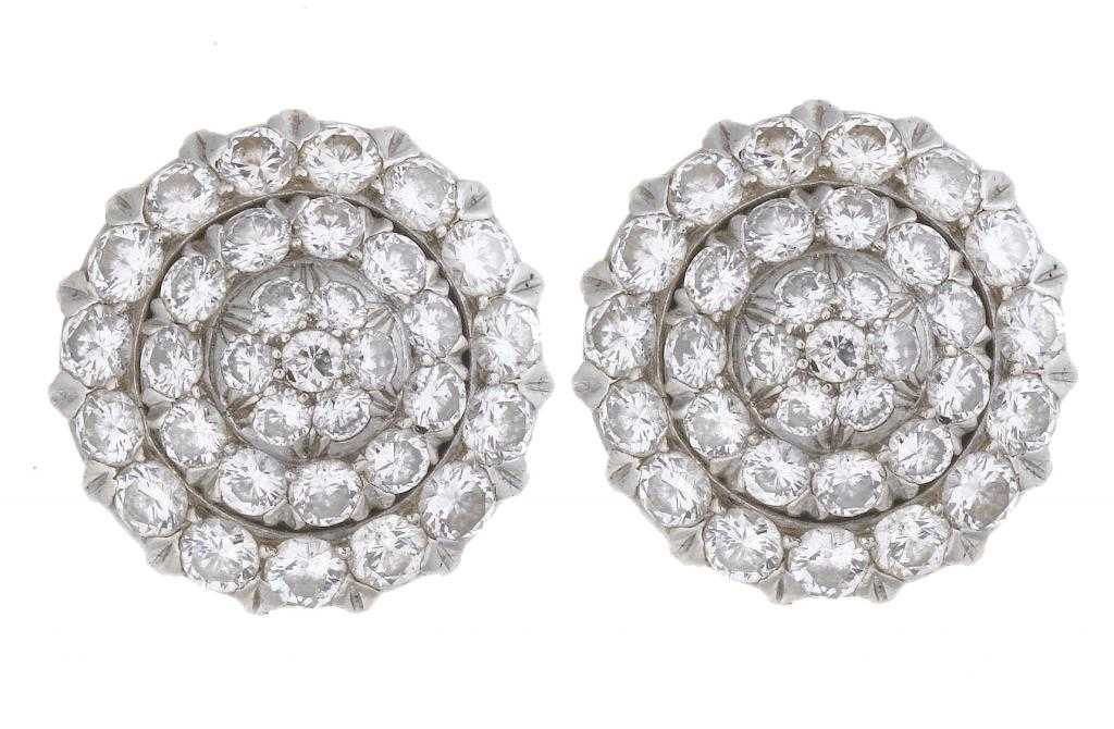 Appraisal: A PAIR OF DIAMOND CLUSTER EARRINGS designed as concentric circles