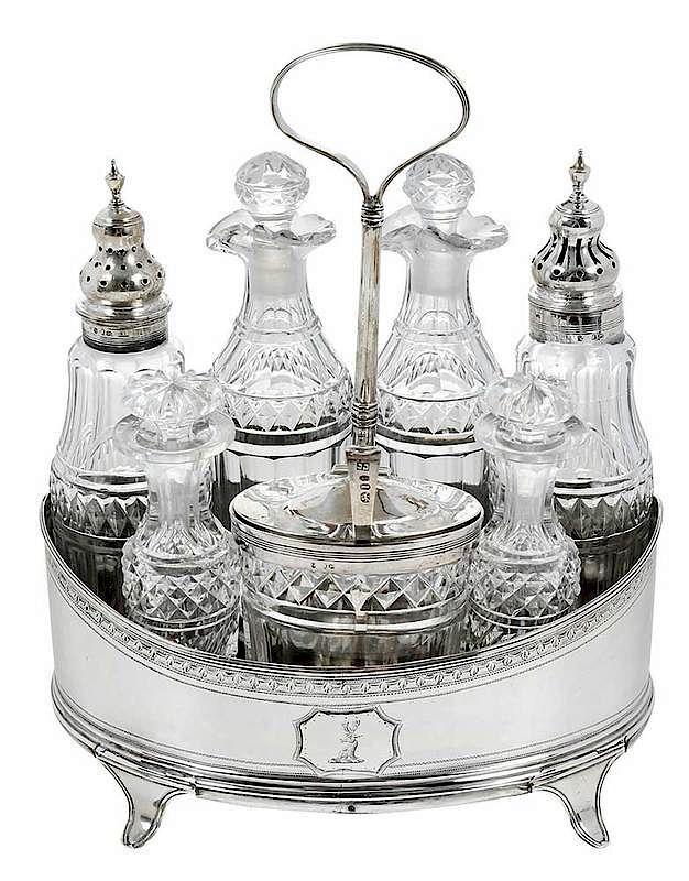 Appraisal: Eight Piece Cruet Set London oval form engraved decoration wood