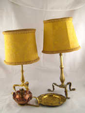 Appraisal: A copper and brass hand candlestick in the Arts and