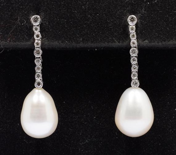 Appraisal: PEARL AND DIAMOND EAR PENDANTS White gold Fancy ear pendants