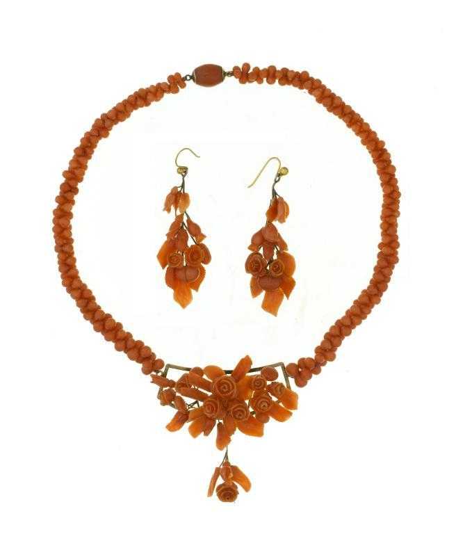 Appraisal: AN ANTIQUE CORAL DEMI-PARURE of necklace and earrings carved as