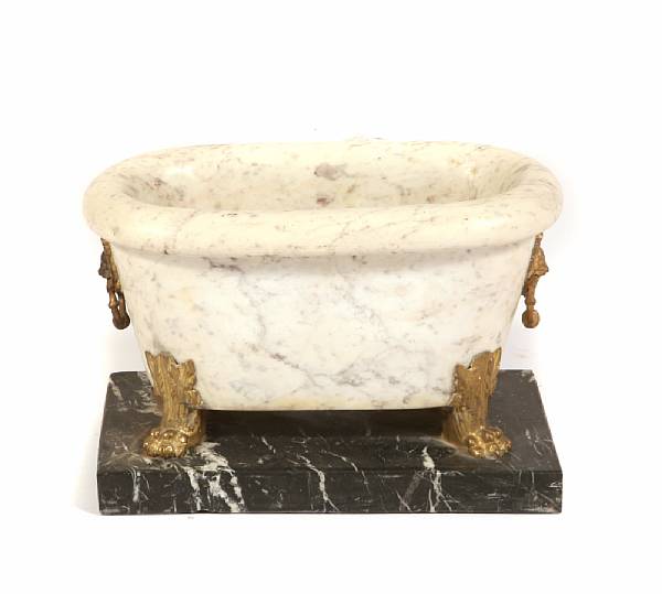 Appraisal: An Italian oval marble and gilt bronze mounted figural jardinere