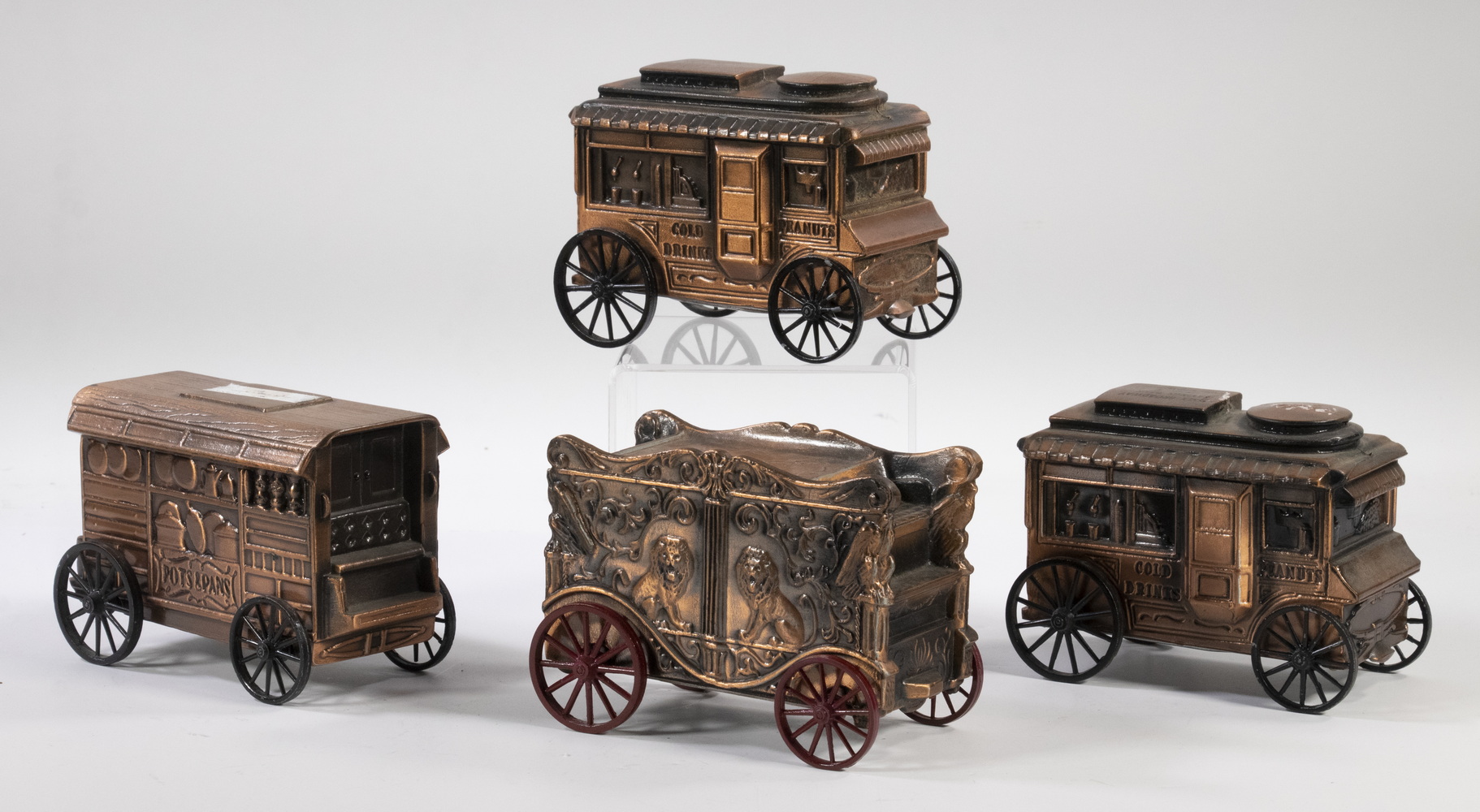 Appraisal: BANTHRICO NOVELTY WAGON STILL BANKS All in Copper Finished Cast