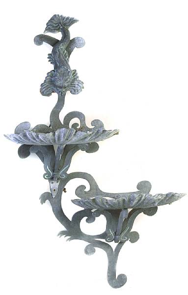 Appraisal: A patinated metal wall jardiniere height in width in depth