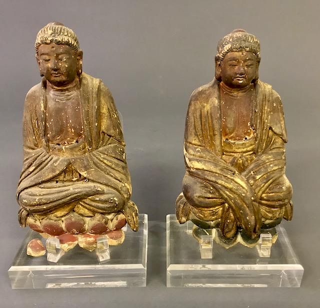 Appraisal: Two Chinese Ceramic Carved Seated Buddhas Two Chinese ceramic carved