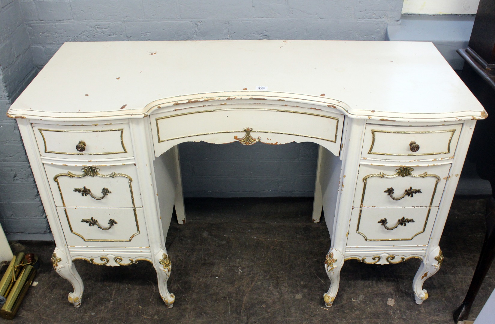 Appraisal: A reproduction white and gilt painted dressing table in Louis