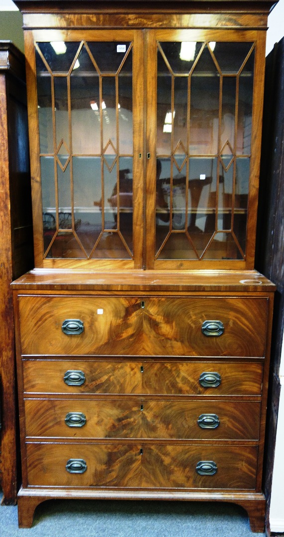 Appraisal: A George III mahogany secretaire display cabinet the pair of