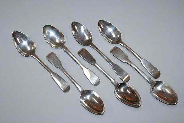 Appraisal: SEVEN SILVER FIDDLE PATTERN DESSERT SPOONS one by Samuel Neville