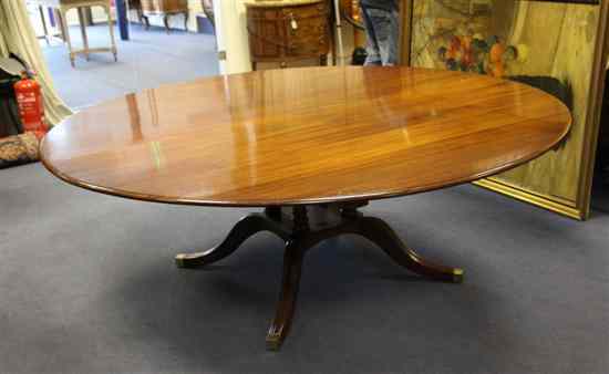 Appraisal: A large Regency design mahogany circular dining table on fluted