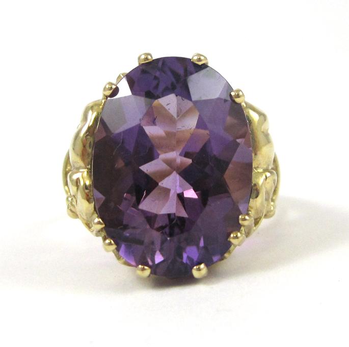 Appraisal: AMETHYST AND TEN KARAT GOLD SOLITAIRE RING set with a