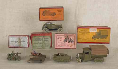 Appraisal: Five Britain toy vehicles in original boxes early th c