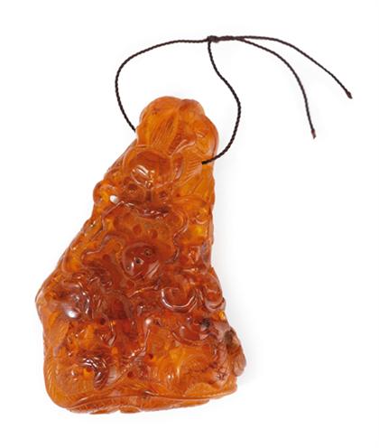 Appraisal: Good Chinese carved amber pendant early th century Of good