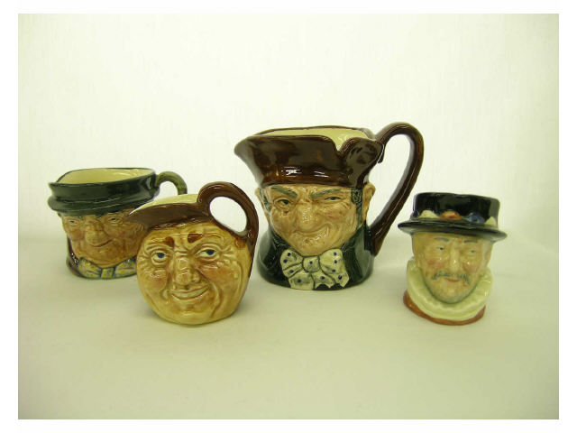 Appraisal: Four Royal Doulton small Toby mugs including Old Charlie Beef