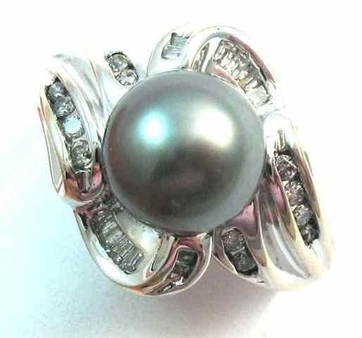 Appraisal: BLACK PEARL AND DIAMOND RING k white gold with twelve