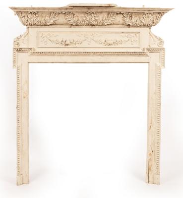 Appraisal: A painted fire surround the pediment with moulded acanthus leaf