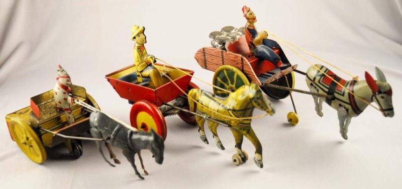 Appraisal: Lot of Animal-Drawn Cart Toys Description American Includes Strauss Jenny