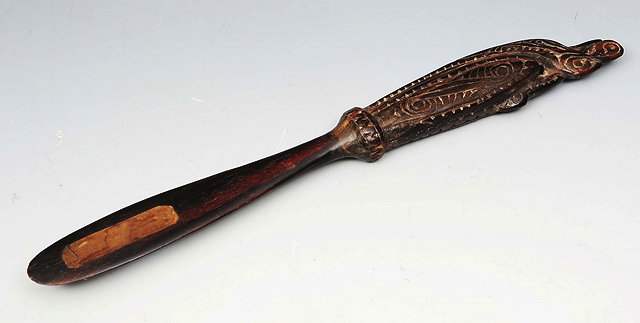 Appraisal: A PAPUA NEW GUINEA TROBRIAND ISLANDS CARVED WOODEN SPATULA with