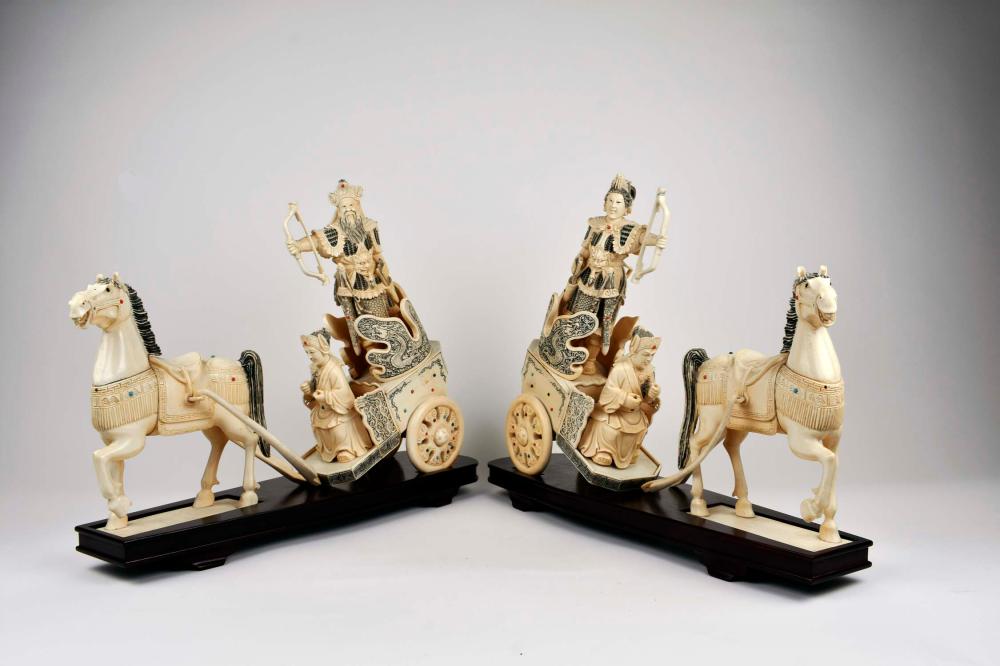 Appraisal: PAIR OF CHINESE JEWEL-CLAD HORSE WARRIORS IN CHARIOTSThe chariots driven