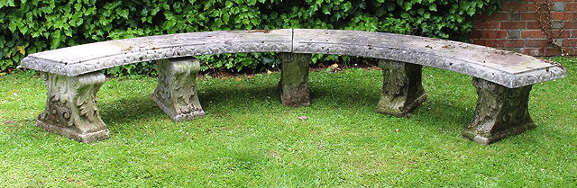 Appraisal: A COMPOSITE CAST STONE LARGE SEMI-CIRCULAR GARDEN SEAT with five