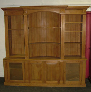 Appraisal: A pine bookcase cupboard late th century the dentil frieze