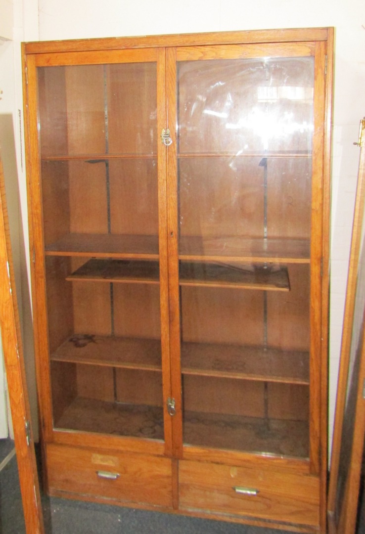 Appraisal: A pair of oak display shop units each with a