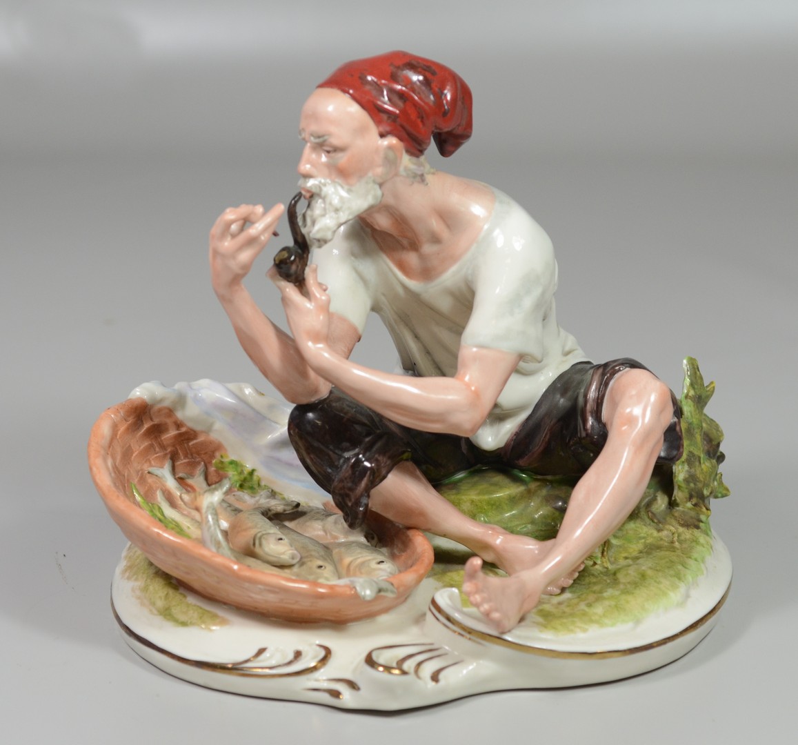 Appraisal: Wilhelm Rittirsch Porcelain Factory-Dresden Art figure of Fisherman Smoking Pipe