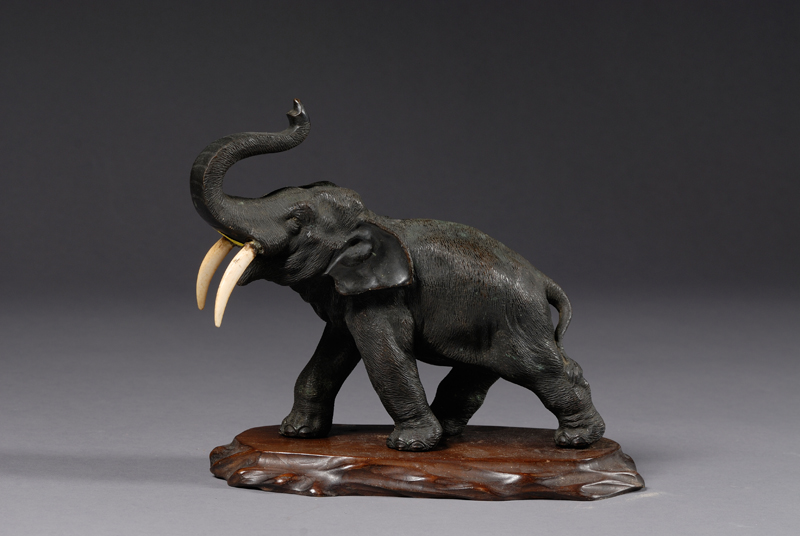 Appraisal: Bronze Elephant Japan late th century ivory tusks lg ht