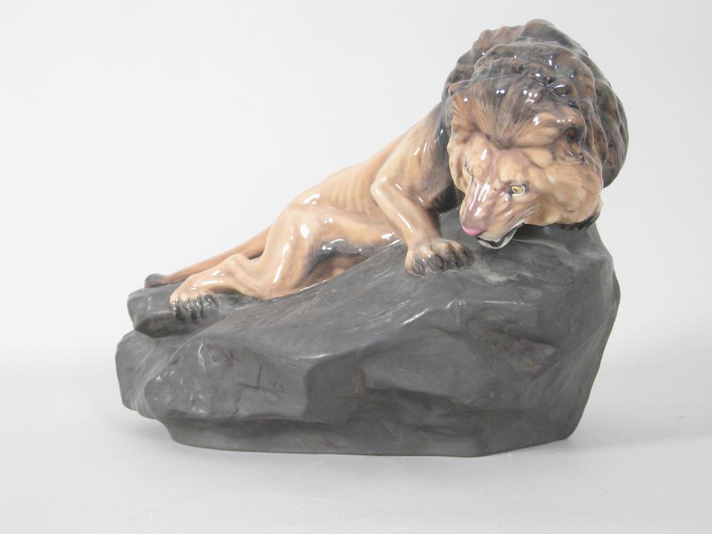 Appraisal: A Royal Doulton Figure of a lion on a rock