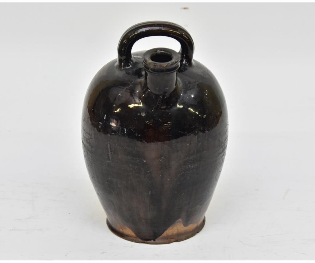 Appraisal: Redware black manganese decorated harvest jug th c with strap