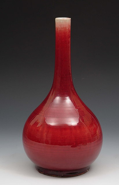 Appraisal: A Chinese sang de boeuf bottle vase th Centurywith bulbous