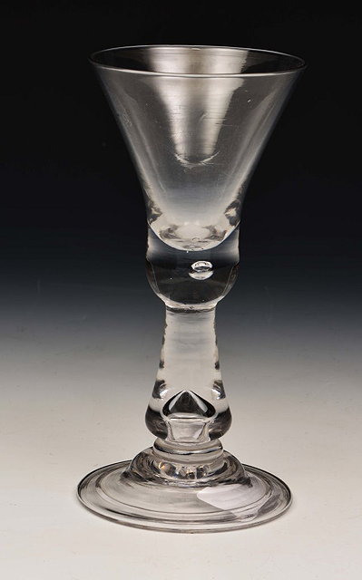 Appraisal: AN ENGLISH WINE GLASS with baluster stem th Century cm