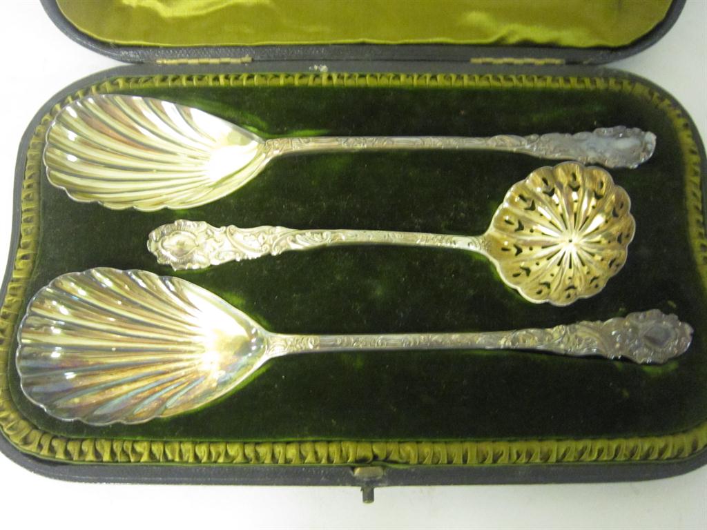 Appraisal: Pair of Victorian silver shell bowl Serving Spoons and Sugar