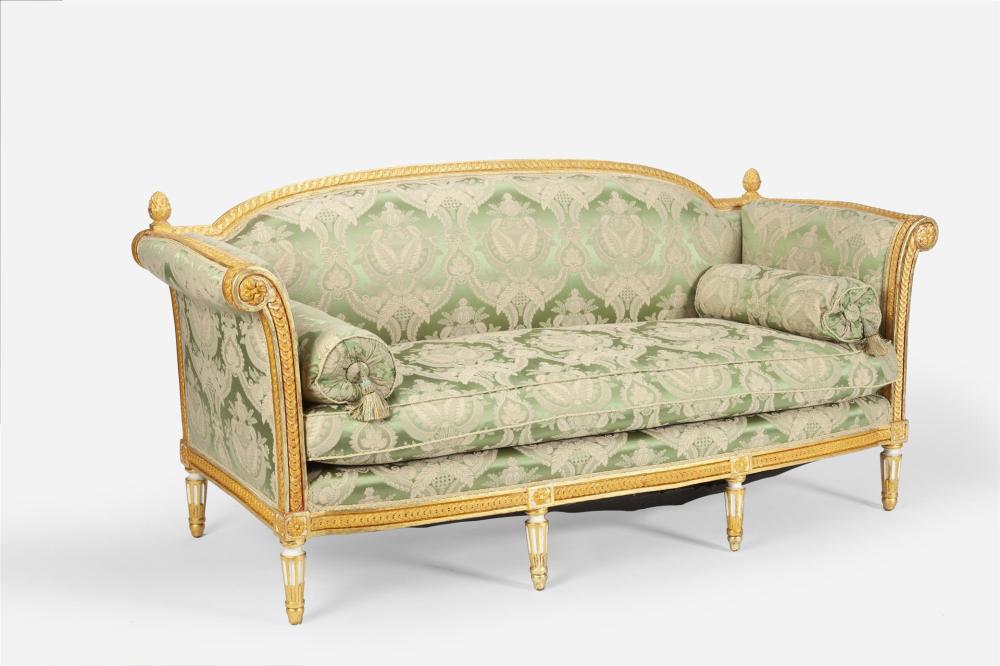 Appraisal: A French Louis XVI carved giltwood sofa Fourth-quarter th Century