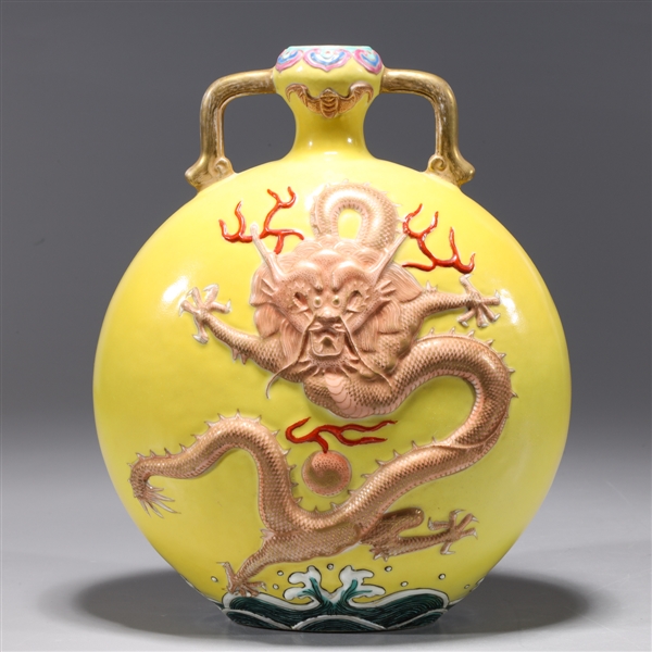 Appraisal: Chinese yellow ground enameled porcelain dragon face with famille rose