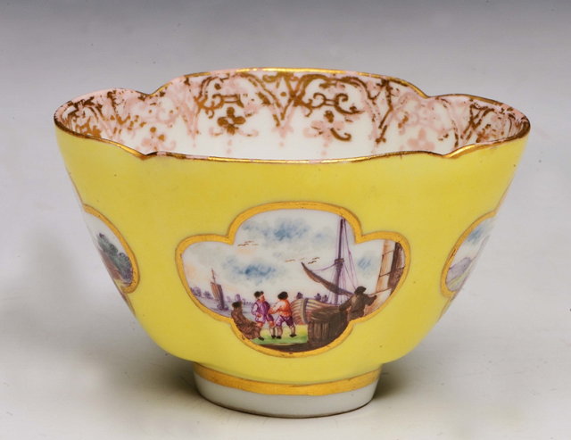 Appraisal: A MEISSEN YELLOW GROUND BOWL painted with four panels of